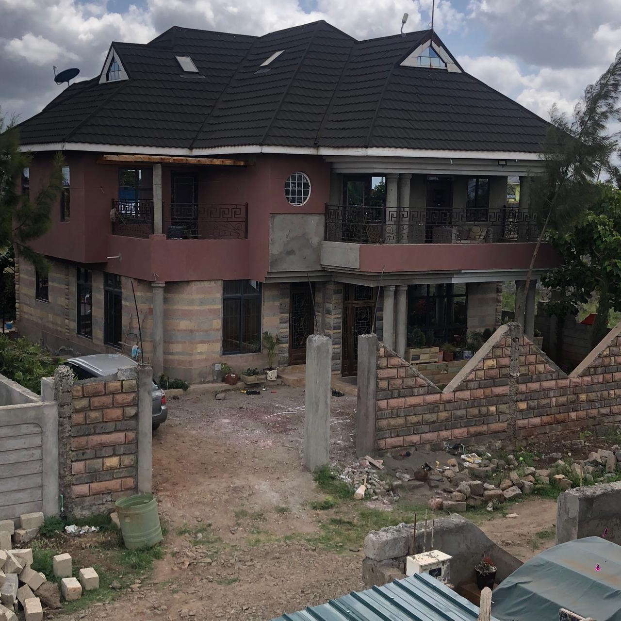 Two-storey residence — walling stage